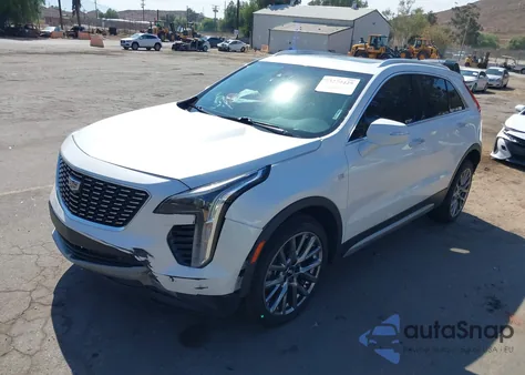 2020 Cadillac Xt4 Fwd Premium Luxury from USA, damaged, VIN 1GYFZCR42LF133877
